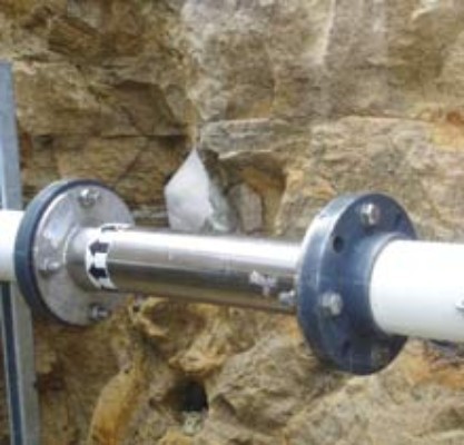 FluidPro Static Mixer installed in situ in a pipeline. Stainless steel static mixer depicted.